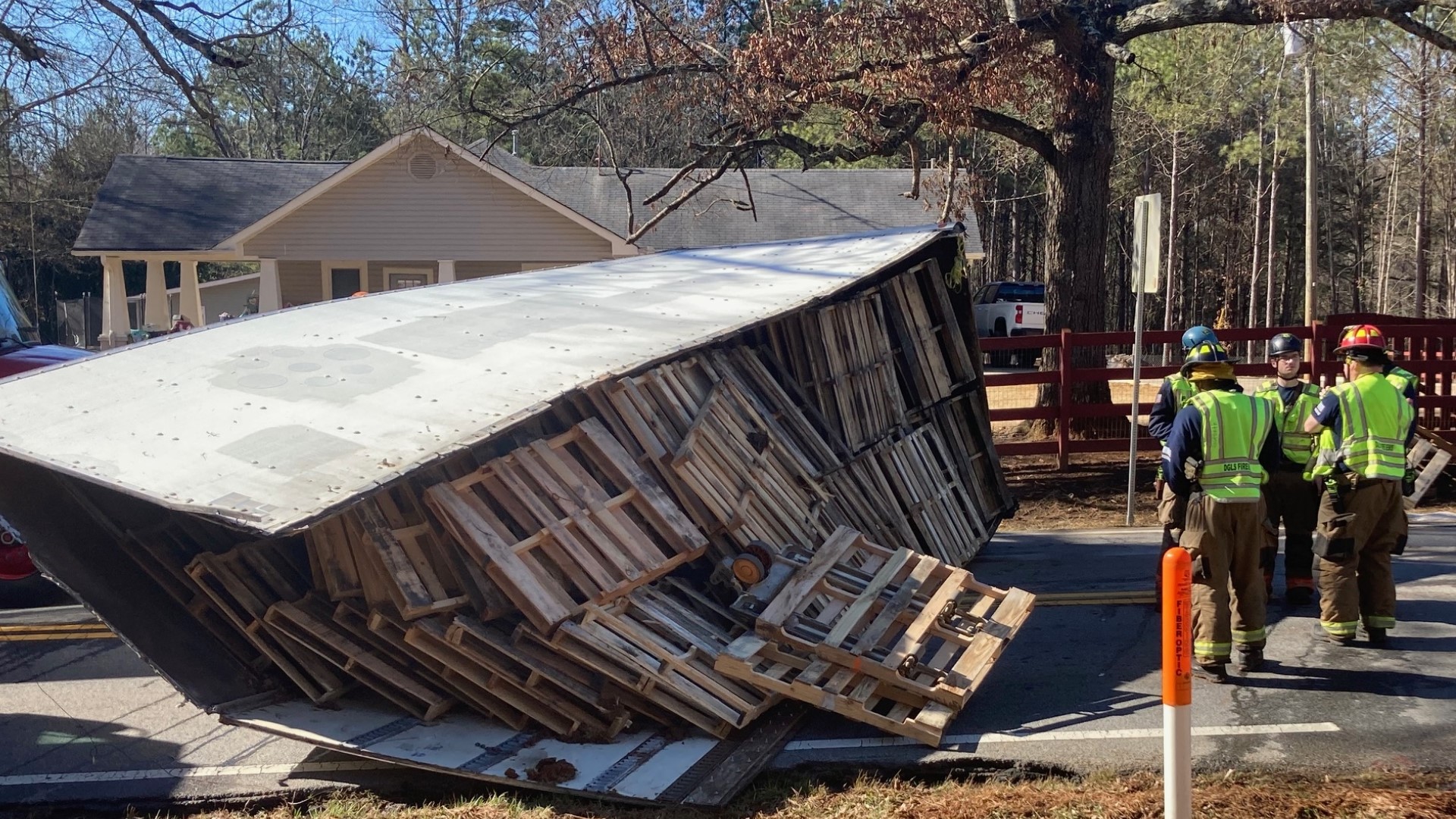 Man freed after box truck overturns, airlifted to hospital | 11alive.com