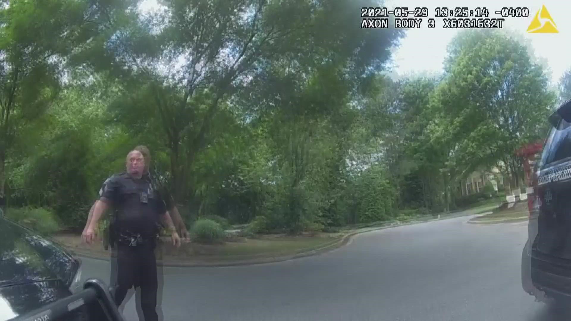 Officer body camera video shows investigators discussing the alleged domestic violence incident.