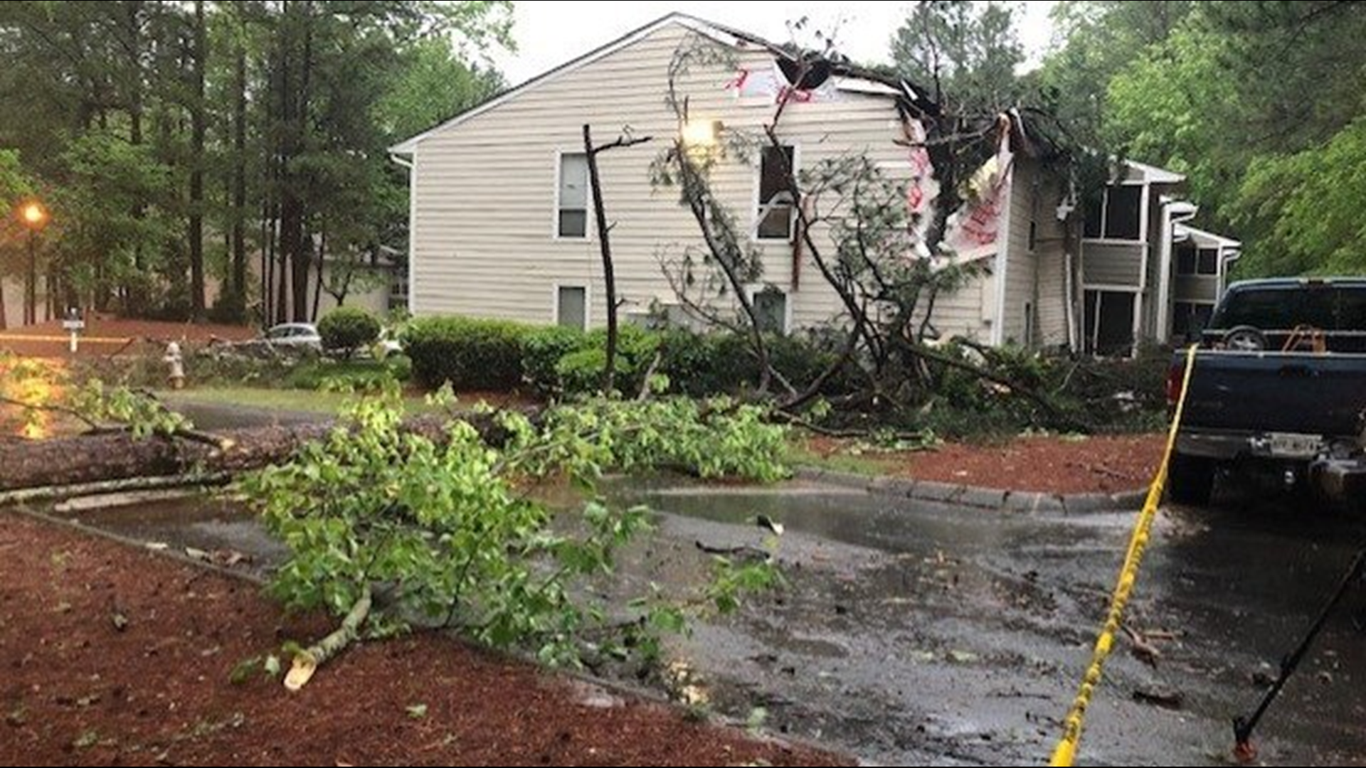 A tree fell on a building at the Columns at Peachtree Corners Apartment during severe weather on April 19, 2019.