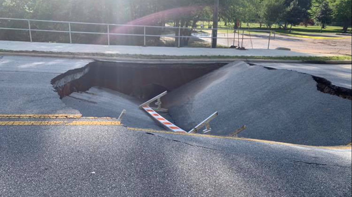 Large sinkhole shuts down road between Rockdale schools in Conyers